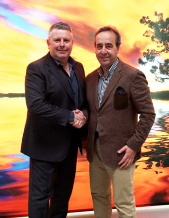 Stewart Bell (left) and Eloi Ferriera shake hands on the opening of MTEX in the UK